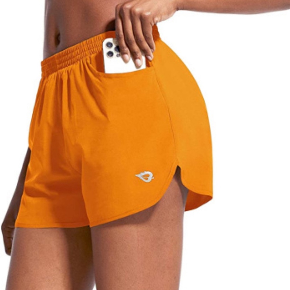Lightly worn orange Baleaf shorts, size medium, soft and stretchy fabric